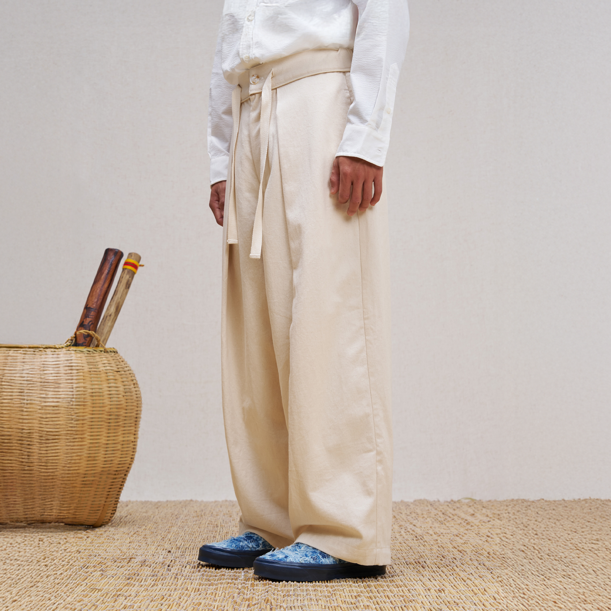 UNLIMITED MOTE Pleated Herringbone Wide-Leg Trousers