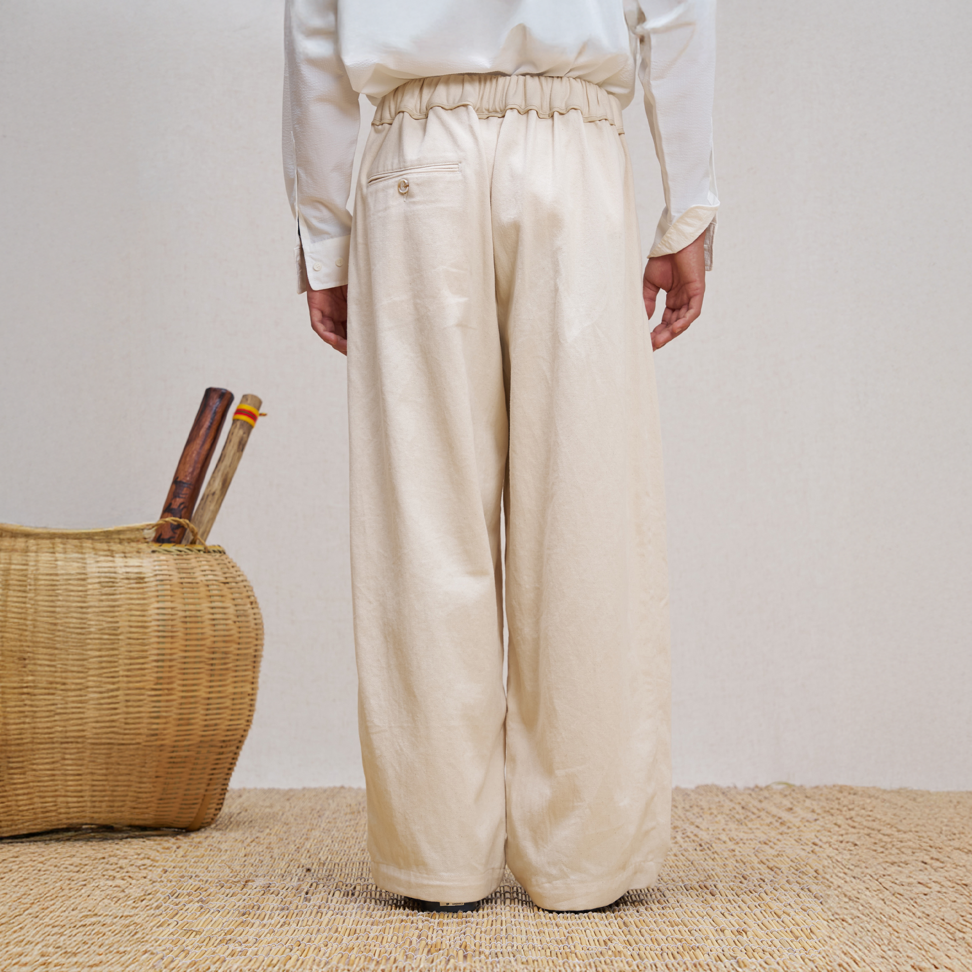 UNLIMITED MOTE Pleated Herringbone Wide-Leg Trousers