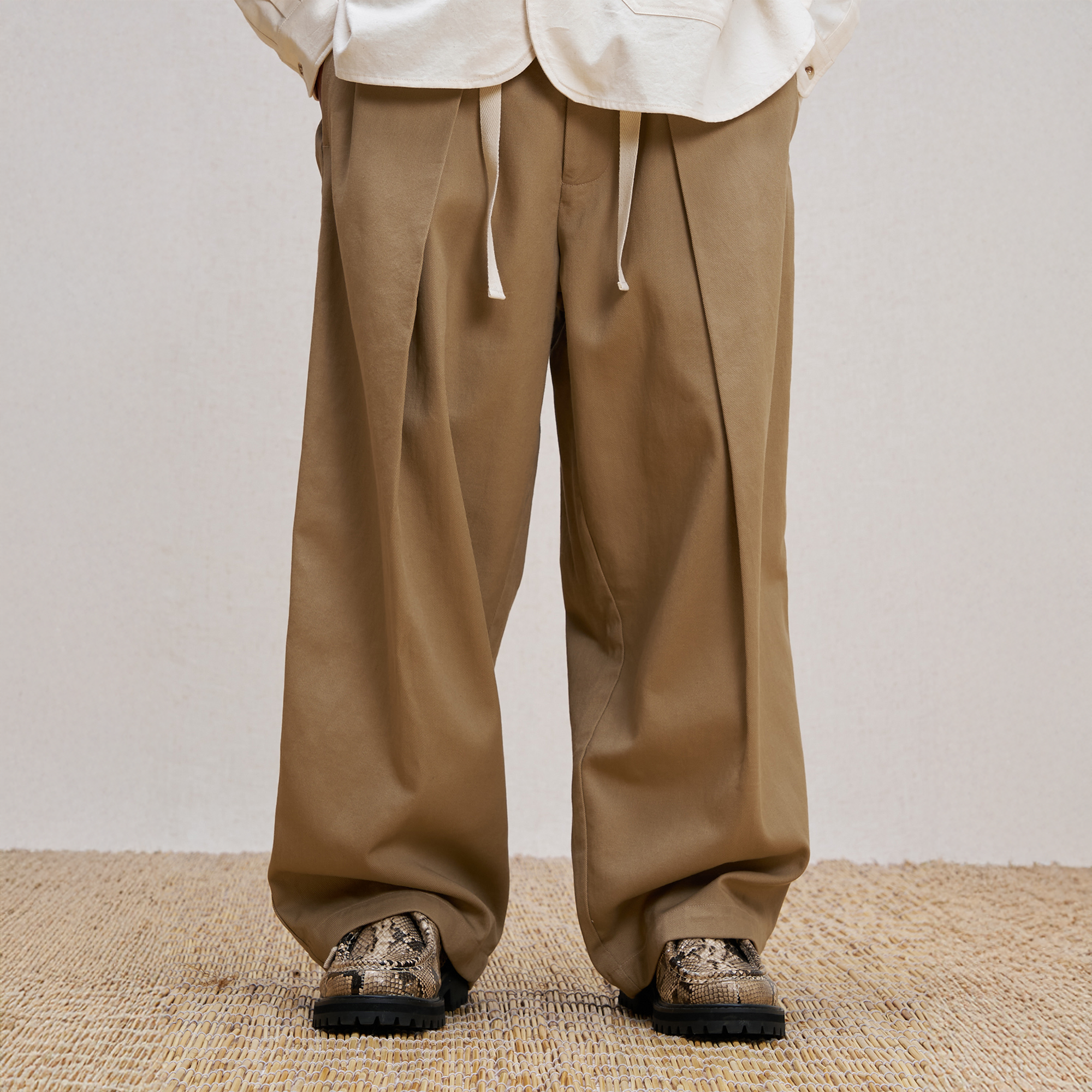 UNLIMITED MOTE Pleated Herringbone Wide-Leg Trousers