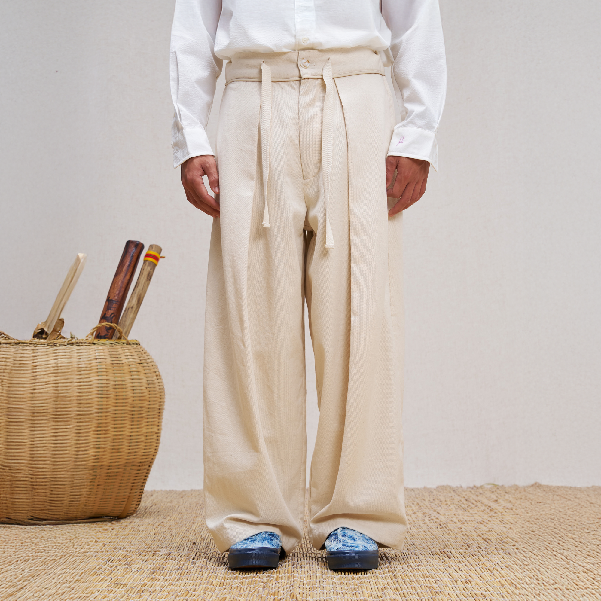 UNLIMITED MOTE Pleated Herringbone Wide-Leg Trousers